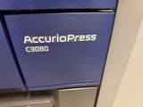 an image of a close up of a blue machine with the word accuripresss on it