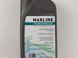 a close up of a bottle of marine transine on a white surface