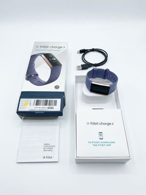 a box with a watch and a charger attached to it