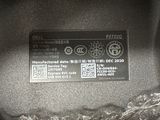 a label on the back of a bag that says dell