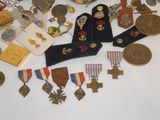 a table with a lot of medals and medals on it