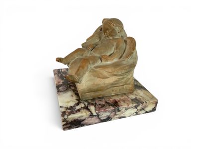 statue of a woman sitting on a chair on a marble base