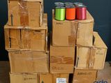 several boxes stacked on top of each other with different colored spools on them