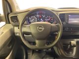dashboard view of a car with a steering wheel and dashboard controls