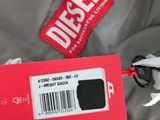 a red box with a tag on it and a pair of scissors next to it