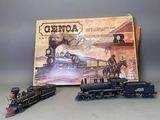 un circuit de train miniature et une boîte de jeux posés sur la table