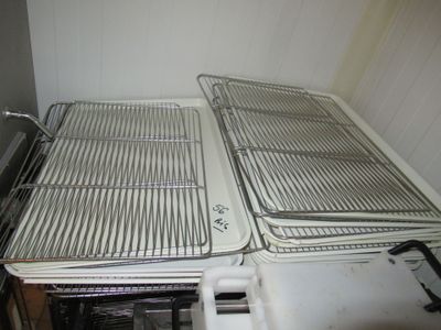 two oven racks on top of each other in the kitchen