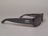 sunglasses on a table with a white background and a gray background