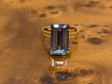 an image of a ring with a green tourmaline on it