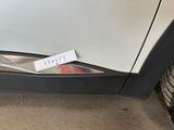 a sticker on the side of a car that has a sticker attached to it