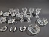 a lot of glass items that are on the table