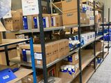 many boxes and boxes on the shelves in the warehouse