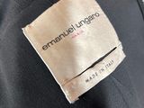 an image of a label on a jacket that says, ` ` person '