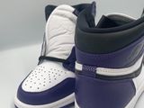 purple and white air jordan 1 high top sneakers on a white surface