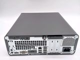 a small computer with a hard drive on top of it