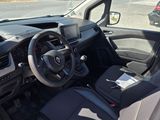 a car that has a steering wheel and a seat in it