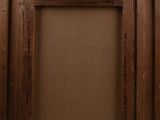 an old picture frame with a picture of a cat on it