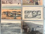 a picture of a collection of old photos on a table