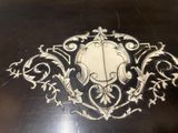 a black table with a white design on it