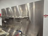 a stainless steel counter top in a commercial kitchen