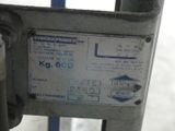 a close up of a sign on the side of a gate