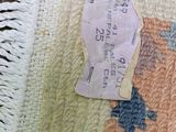 a piece of paper that has been placed on a rug
