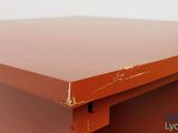 an image of a close up of a desk with a red top
