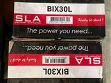 two boxes of bx30l and a box of bx30l are stacked on top of each other