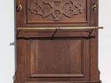 a wooden door that has a metal handle on it