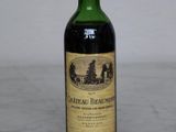 a bottle of wine that is sitting on a table
