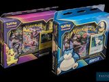two boxes of pokemon cards are shown on a black background