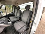 a view of the inside of a van from the driver ' s seat