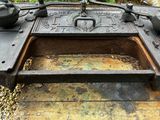 an old stove with a pot on top of it