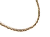 a close up of a gold rope necklace on a white background