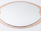 a mirror that is on the wall in the room