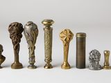 a lot of different types of candlesticks on a table