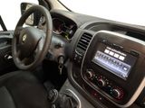 the interior of a car with a steering wheel and dashboard controls