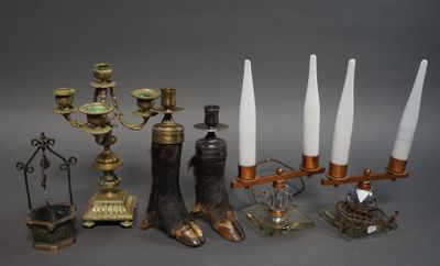 many different types of candles that are on the table