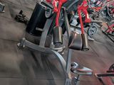 a picture of a gym with a lot of machines