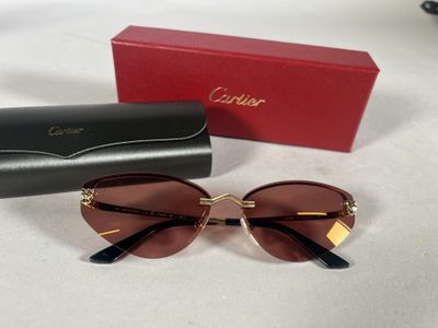 a close up of a pair of sunglasses on a table