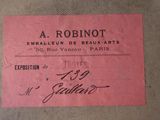 a close up of a pink ticket with a black writing on it