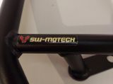 a close up of a bicycle frame with a sticker on it