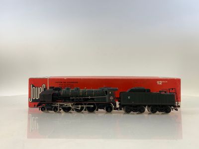 an image of a toy train on a white surface with a red box in the background
