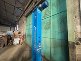 an image of a blue door in a warehouse