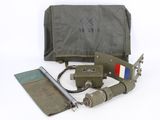 a bag with a knife and other items in it