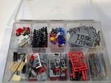 a clear box with a bunch of legos in it