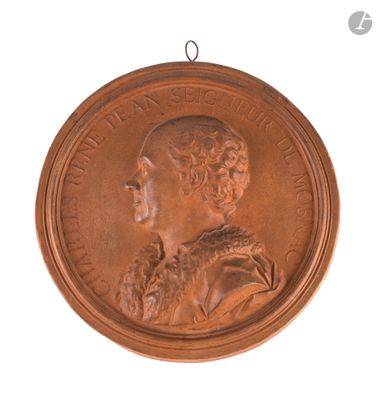 une image représentant une médaille de bronze sur laquelle figure le profil d'une femme
