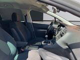 the interior of a car with the front seats down and the center console up