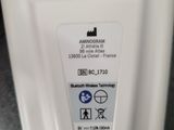 a close up of a white toilet with a label on it