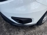a close up of a car ' s front bumper